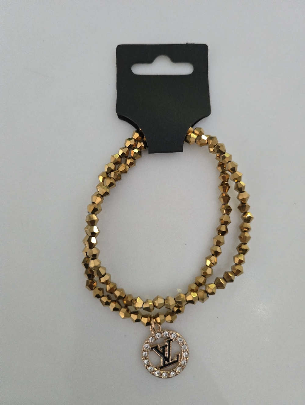 Gold Beaded Stretch Bracelet with Crystal-Trimmed Pendant